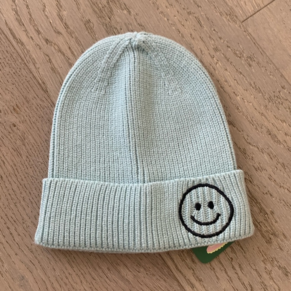 Sky blue beanie with smiley face NWT rainbow unicorn surprise brand from NYC